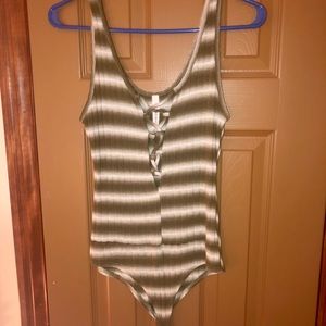 Green striped body suit